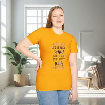 Life is short smile while she you still have teeth | Unisex Soft T-shirt